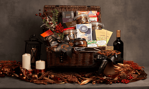 Velas perfumadas y canasta de chocolate